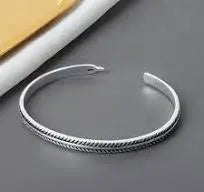 Timeless Charm of 925 Sterling Silver: The Vintage Feather Bracelet