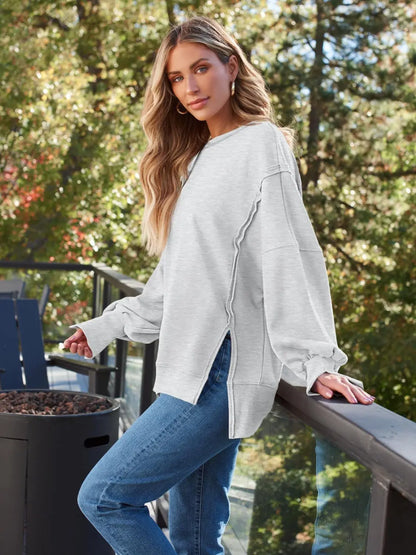 Slit Round Neck Long Sleeve Sweatshirt Trendsi