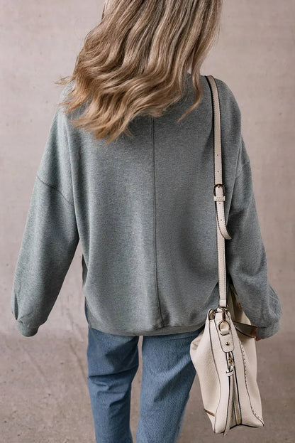 Slit Round Neck Long Sleeve Sweatshirt Trendsi