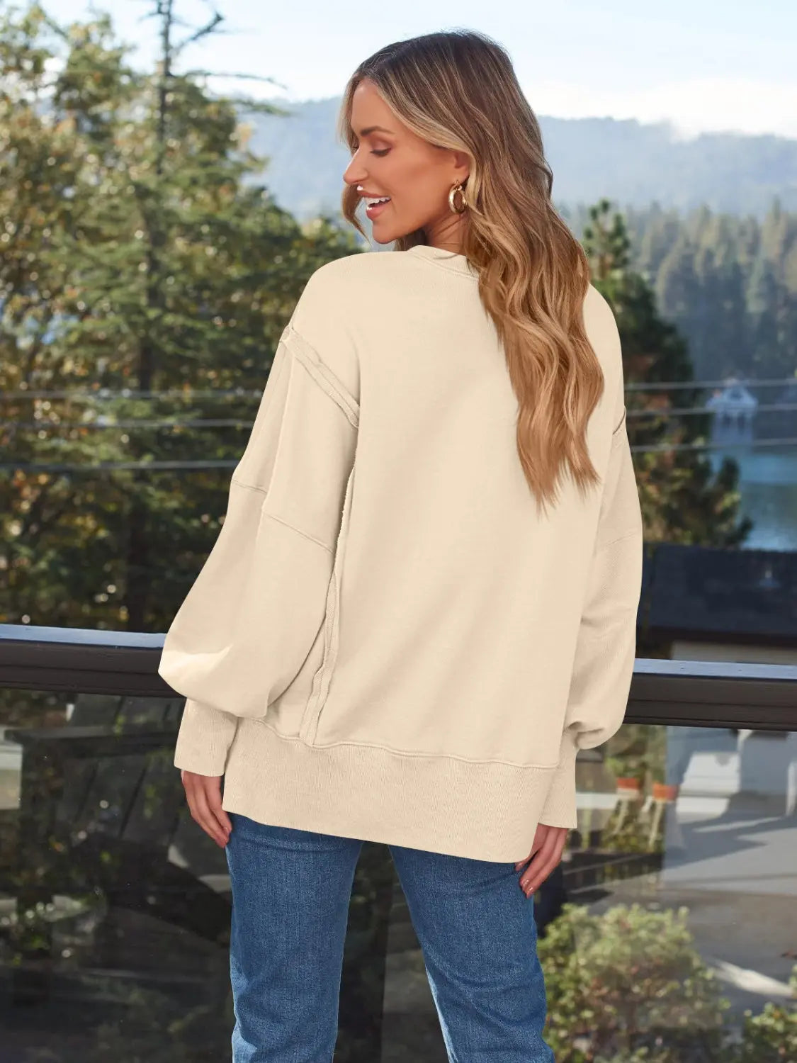 Slit Round Neck Long Sleeve Sweatshirt Trendsi